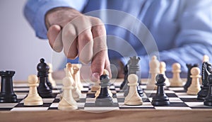 Man playing chess. Competition strategy concept