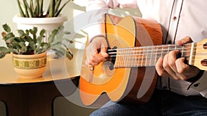 Man playing a classical guitar