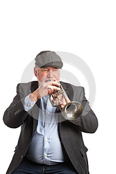 A man playing a cornet