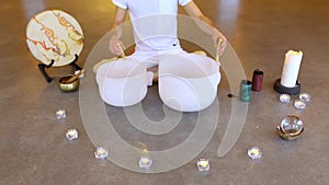 Man playing crystal bowls healing music.
