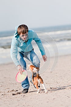 Man playing with dog