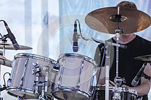 Man playing drums on stage