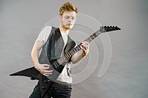 Man playing on electric guitar