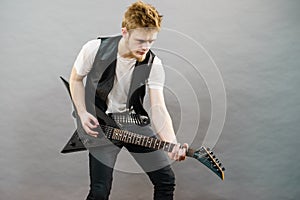 Man playing on electric guitar