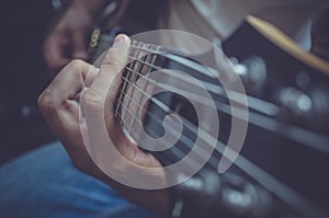 Man playing on electric guitar, music concept