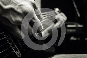 Man playing on electric guitar, music concept