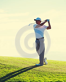 Man Playing Golf