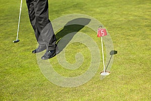 Man playing golf