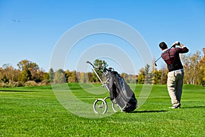 Man playing golf