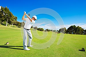 Man Playing Golf