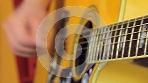 Man Playing Guitar Close Up