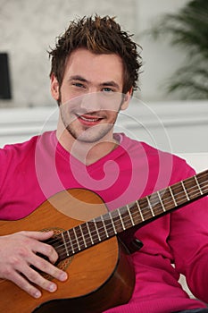 Man playing the guitar