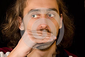 Man playing harmonica (can't be seen)