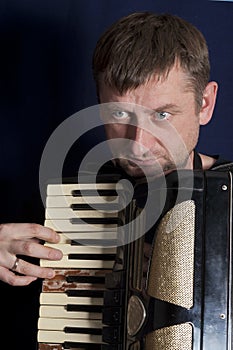 Man Playing Harmonica