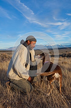 Man playing with his dog