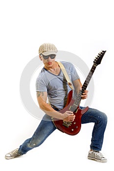 Man playing his electric guitar