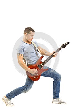 Man playing his guitar