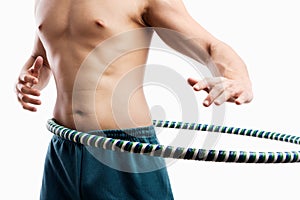 Man playing hula hoop