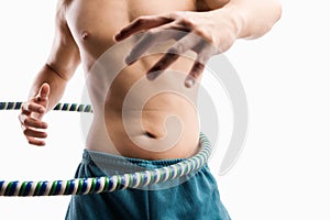 Man playing hula hoop