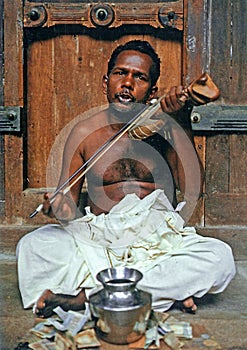 Man playing instrument Nagaveena at Hindu Festival, Mannarasala Sree Nagaraja Temple Mannarasala, Haripad, Kerala