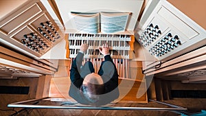 Man Playing On The Keyboard Of An Organ