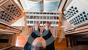 Man Playing By The Organ From Notes