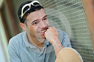 man playing paddle tennis match