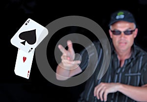 Man playing Poker with Winning Aces