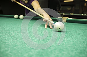 Man playing Russian billiards