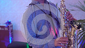 A man playing the saxophone