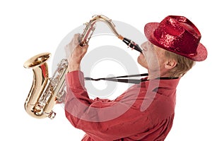 Man playing saxophone with devotion