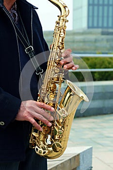 man playing saxphone