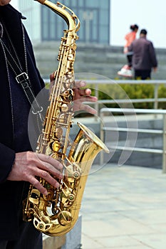 man playing saxphone