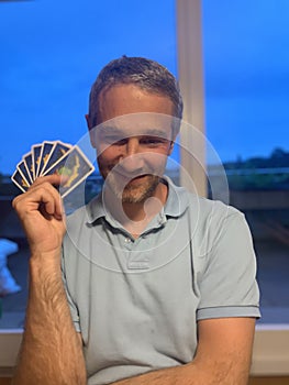 Man playing settlers of Catan photo