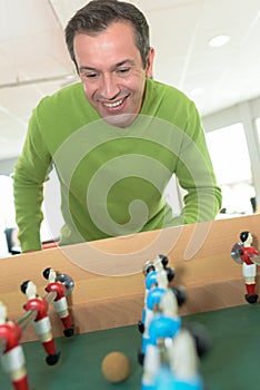 Man playing table football
