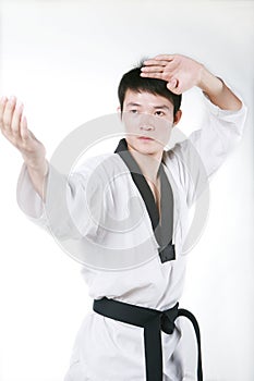 Man is playing with taekwondo