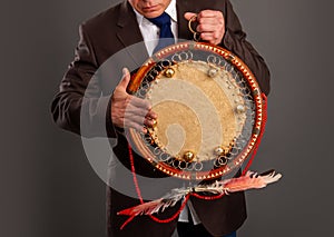 Man playing a tambourine