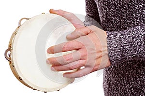 Man playing a tambourine