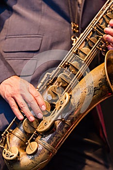 Man playing a tenor saxophone