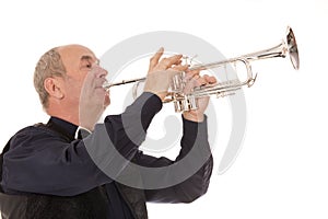 Man playing trumpet on a white