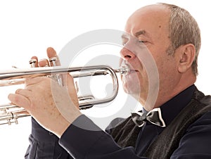 Man playing trumpet on a white