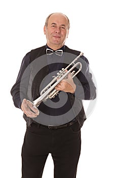 Man playing trumpet on a white