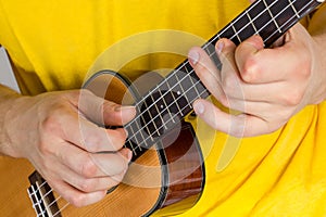 Man playing ukulele