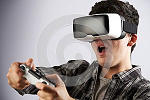 Man Playing Video Game Wearing Virtual Reality Headset