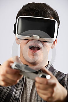 Man Playing Video Game Wearing Virtual Reality Headset