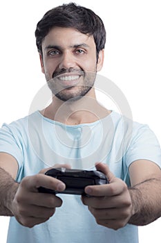 Man playing video game with wireless joystick