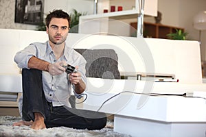 Man playing video games alone