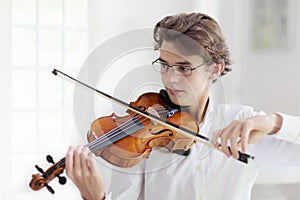 Man playing violin. Classical music instrument