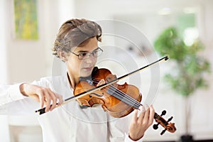 Man playing violin. Classical music instrument