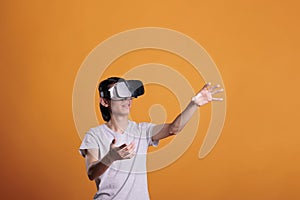 Man playing virtual reality games in vr goggles